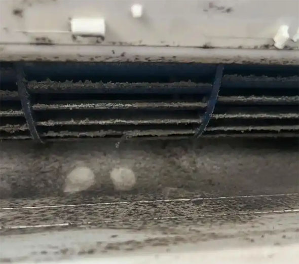 七台河市空调吹的风有股烧焦味是怎么回事